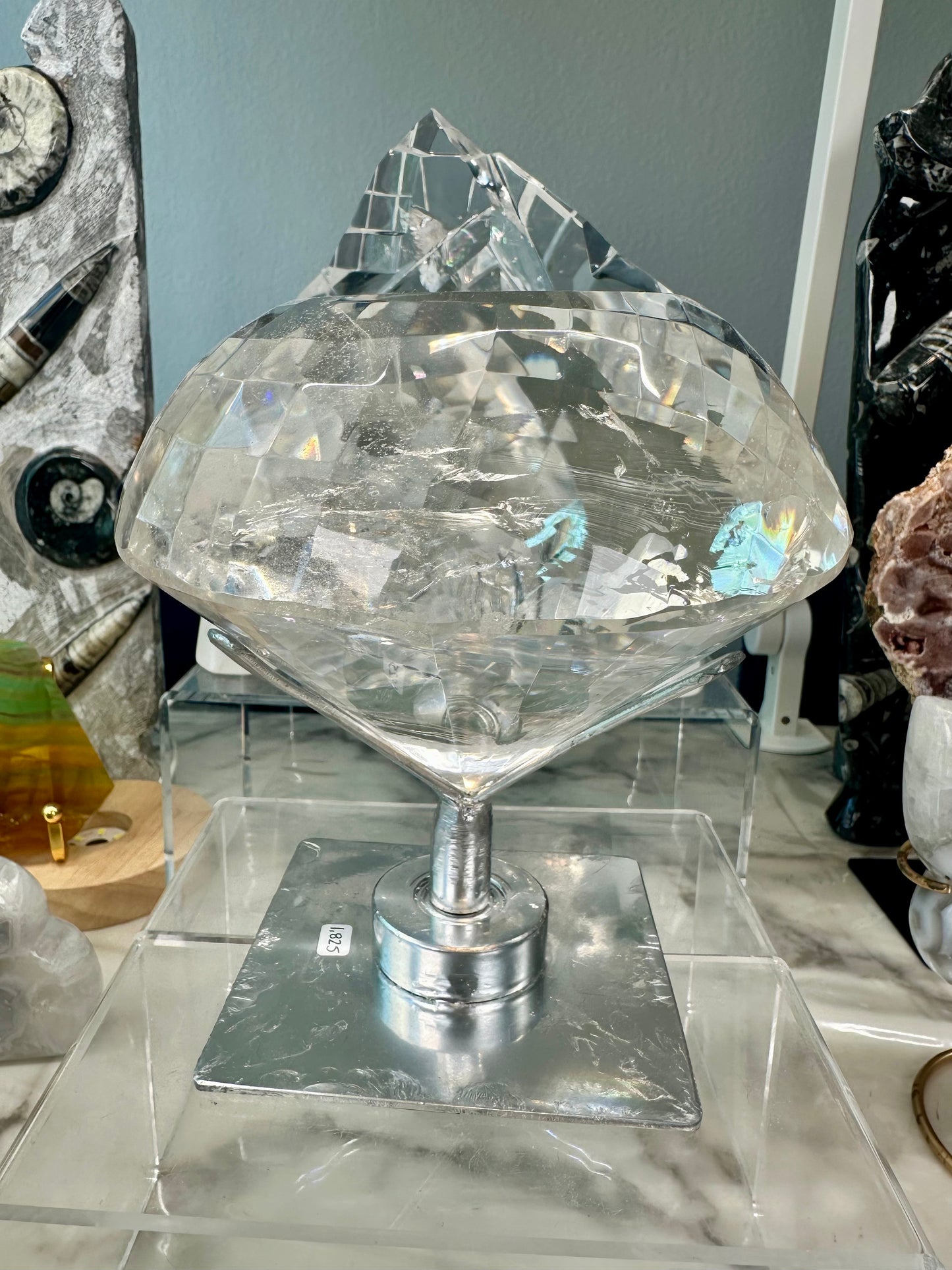 Faceted Quartz Diamond on Spinning Stand