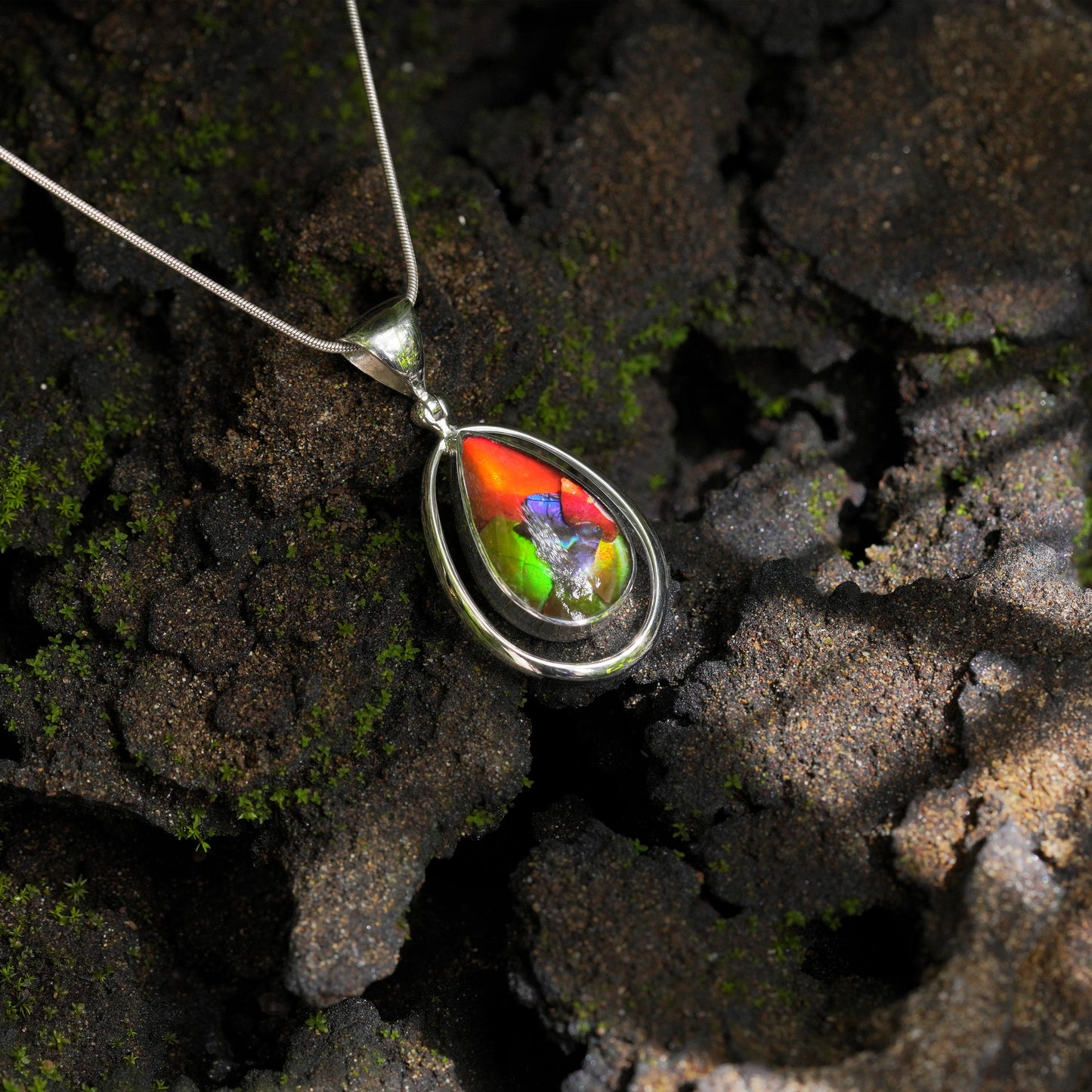 Starborn Ammolite Pear Pendant with Frame in Sterling Silver