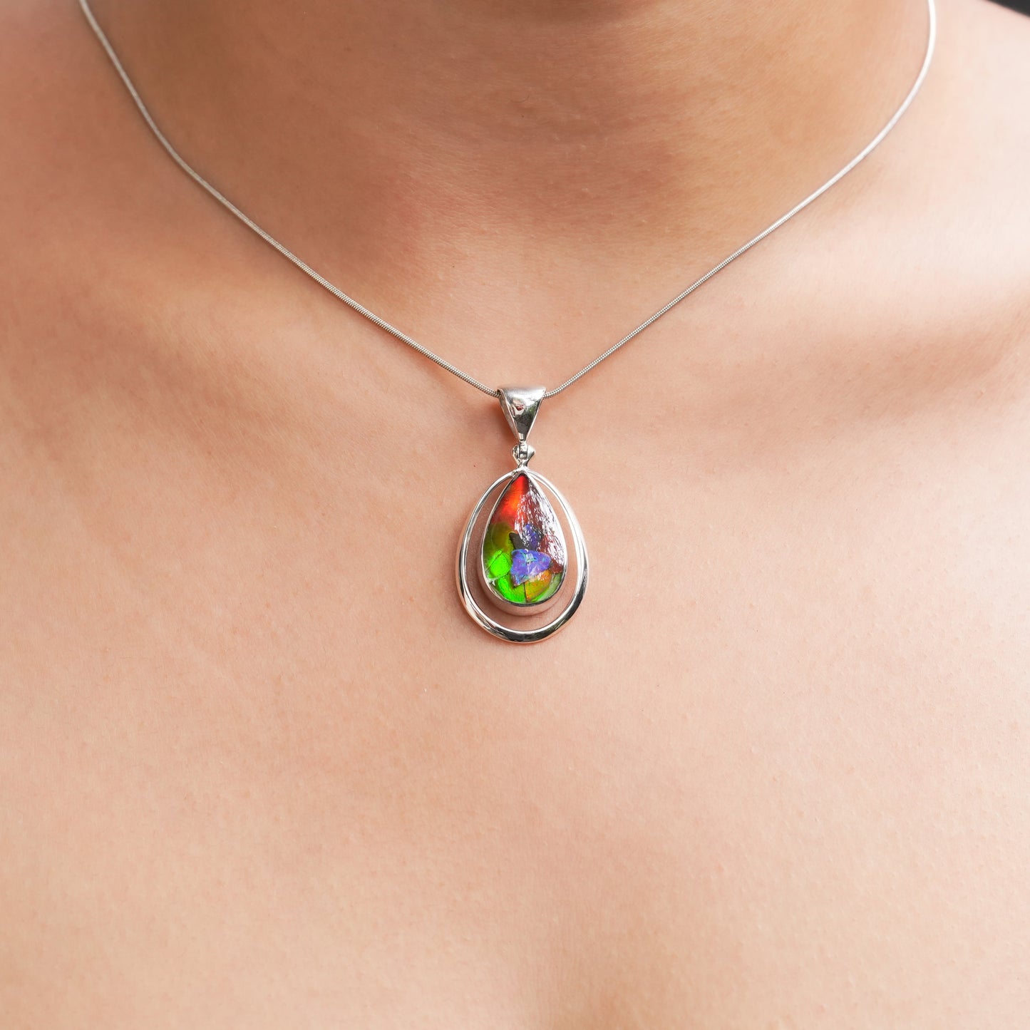 Starborn Ammolite Pear Pendant with Frame in Sterling Silver