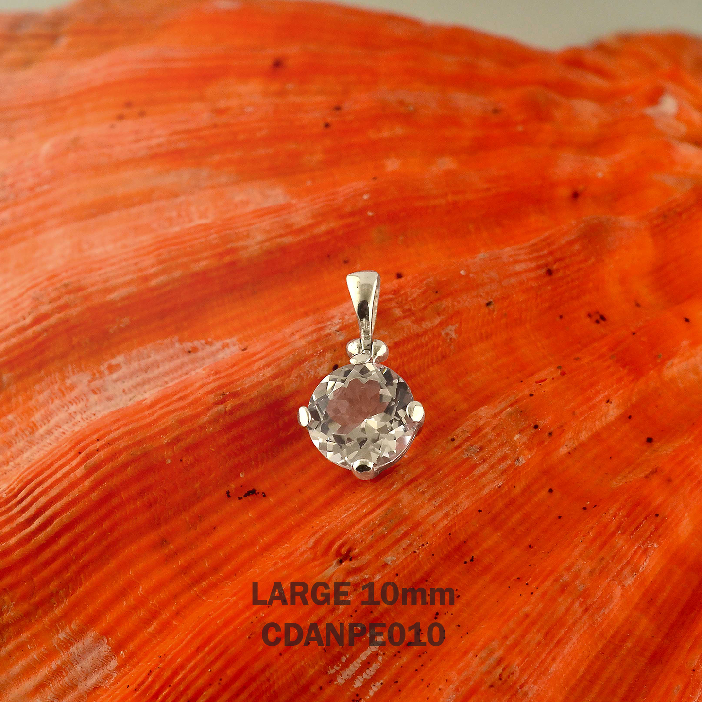 Starborn Danburite Faceted Round Pendant in Sterling Silver