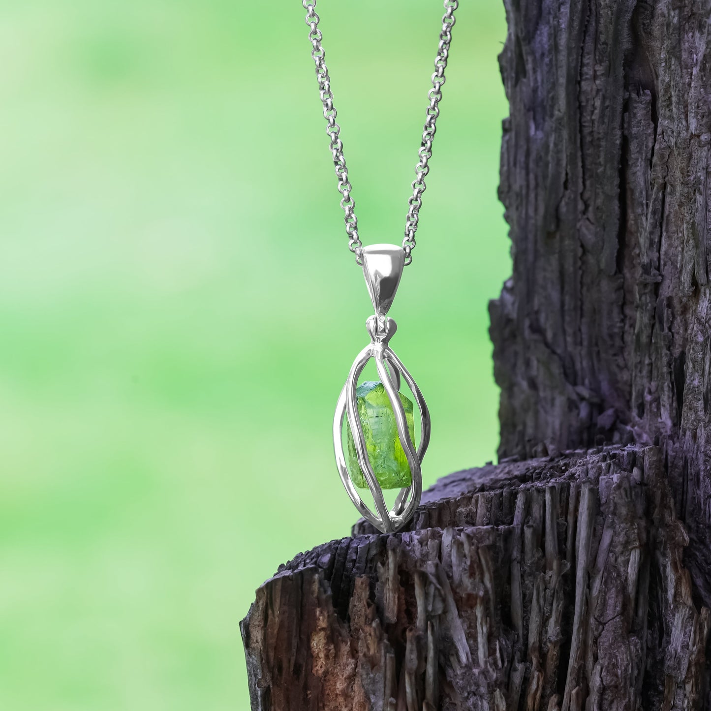 Starborn Peridot Crystal Spiral Cage Pendant in Sterling Silver