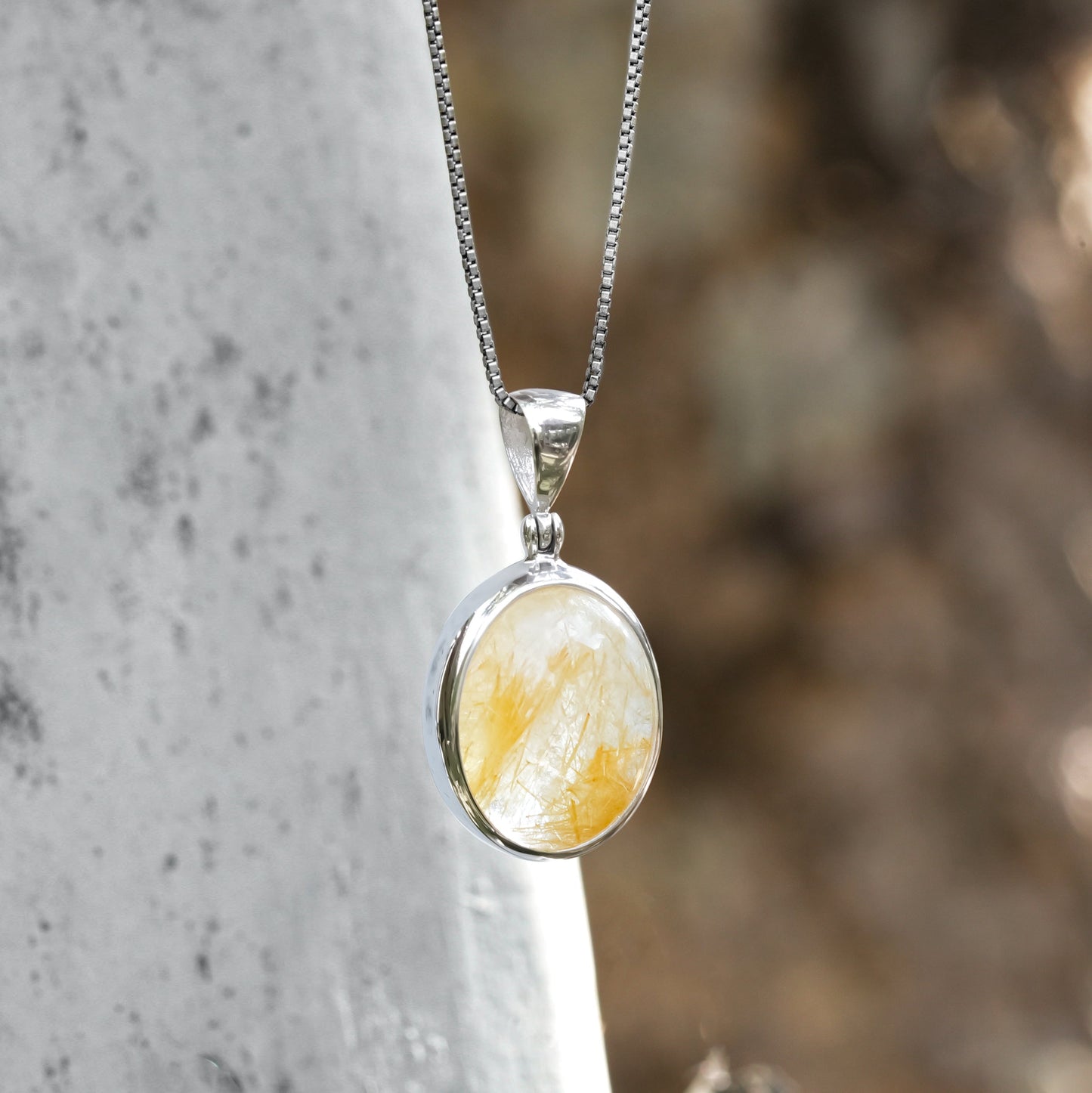 Starborn Rutilated Quartz Oval Pendant in Sterling Silver