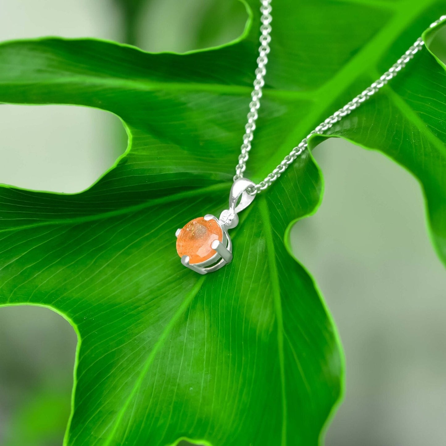 Starborn Round Faceted Sunstone Pendant in Sterling Silver